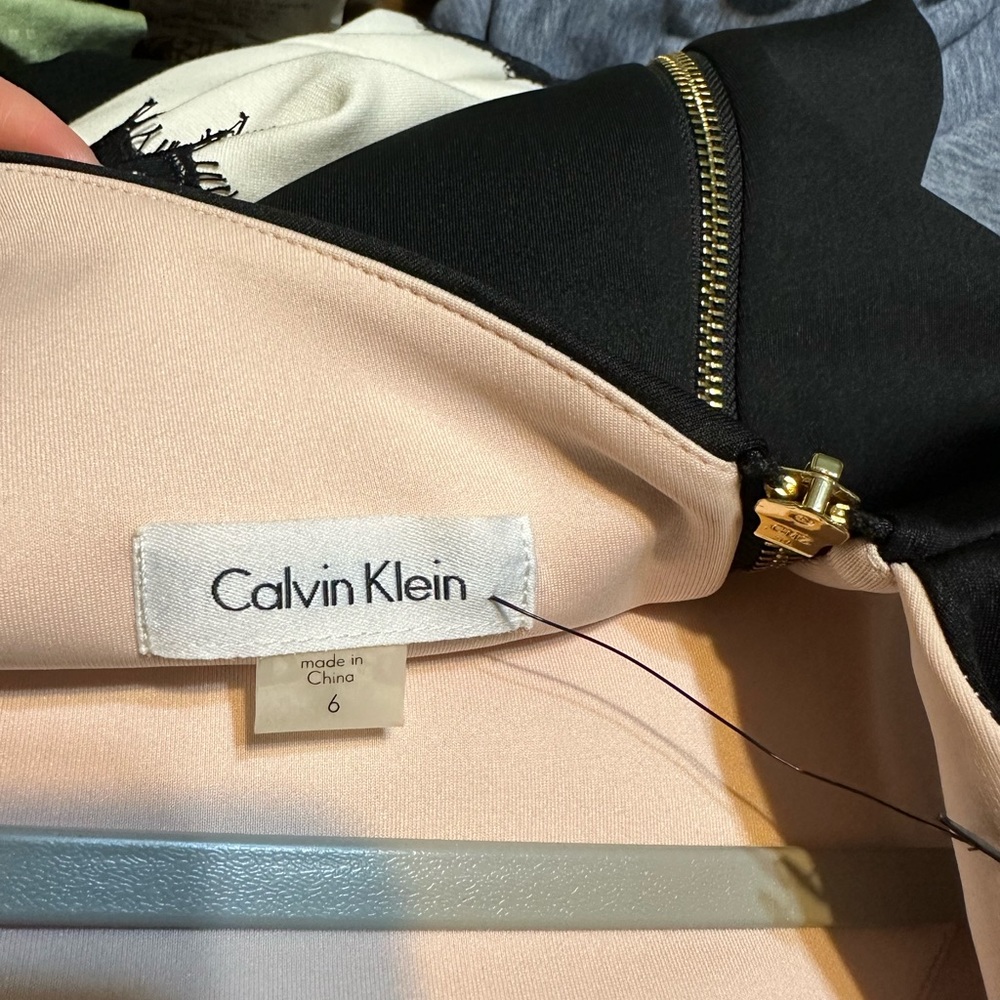 Brand new, never worn. Black with pink accent